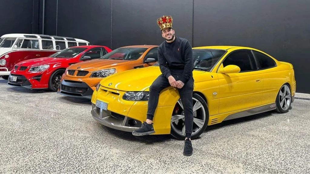 Adrian Portelli with his supercars collection