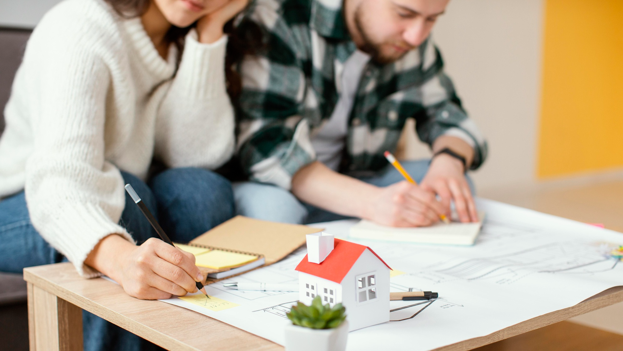 Know which improvements add value. Image source (https://www.magnific.com/free-photo/close-up-couple-taking-notes_12977483.htm#fromView=search&page=1&position=13&uuid=c1f07d56-ec9d-4f66-a85d-c30e339991e4&query=How+to+Plan+a+Home+Renovation+Under+Budget+That+Adds+Value)